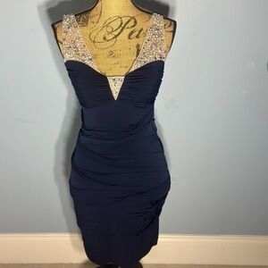 Elegant Blue Dress with Embellished Neckline